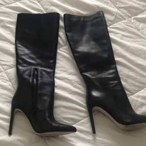 Knee high boots by Guess